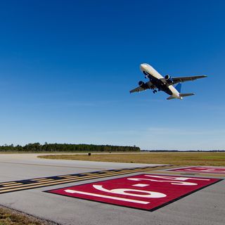 Airplane taking off from the tarmac.