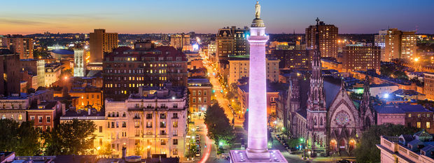 Baltimore, Maryland skyline and waterfront at twilight.