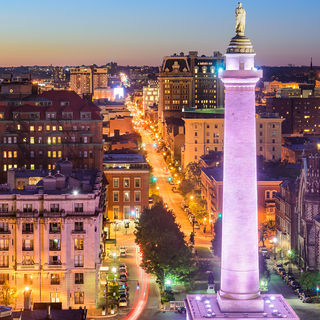 Baltimore, Maryland skyline and waterfront at twilight.